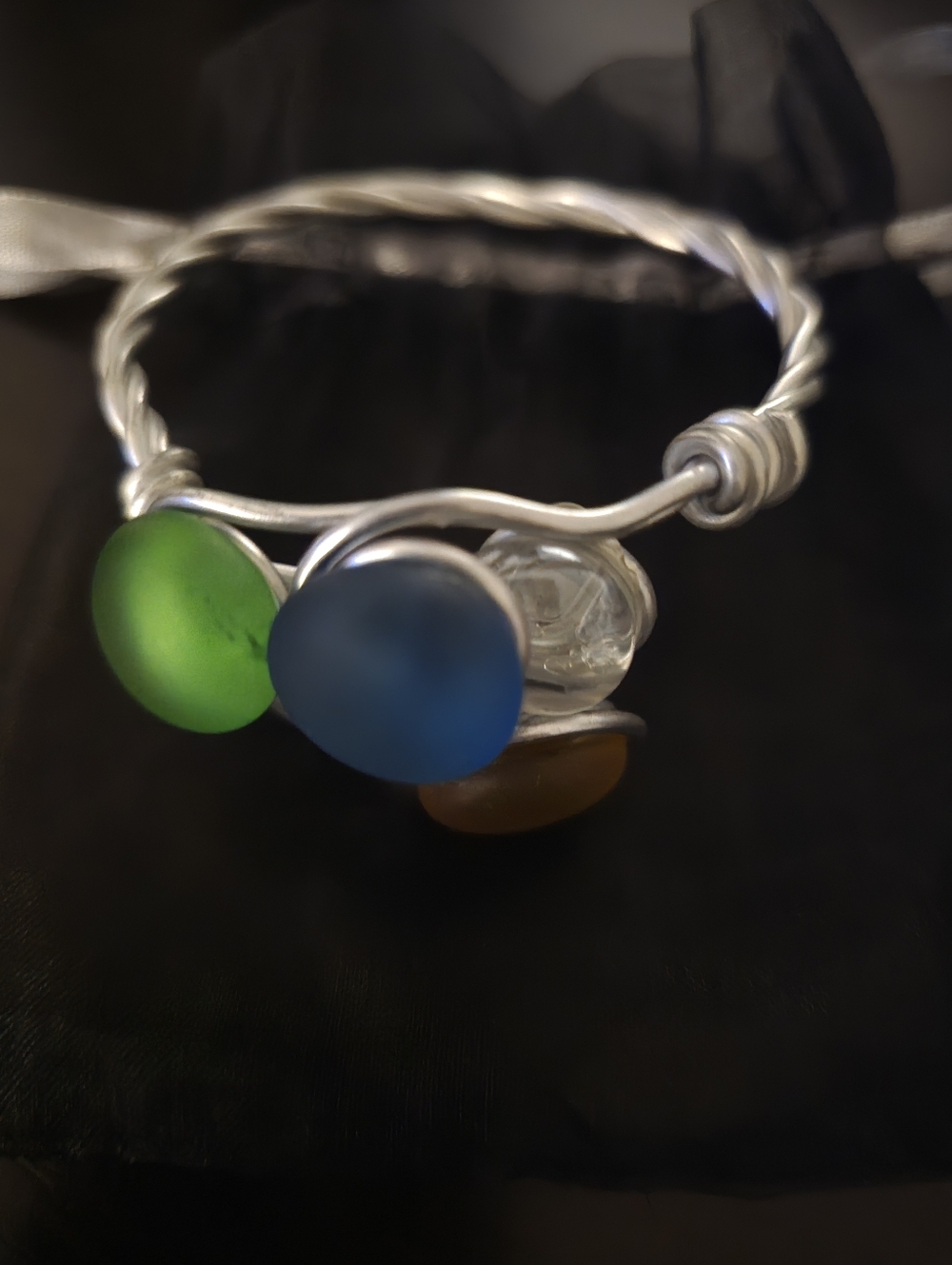 Handcrafted Silver-Tone Wire Bracelet with Yellow, Blue and Green Cabochons.